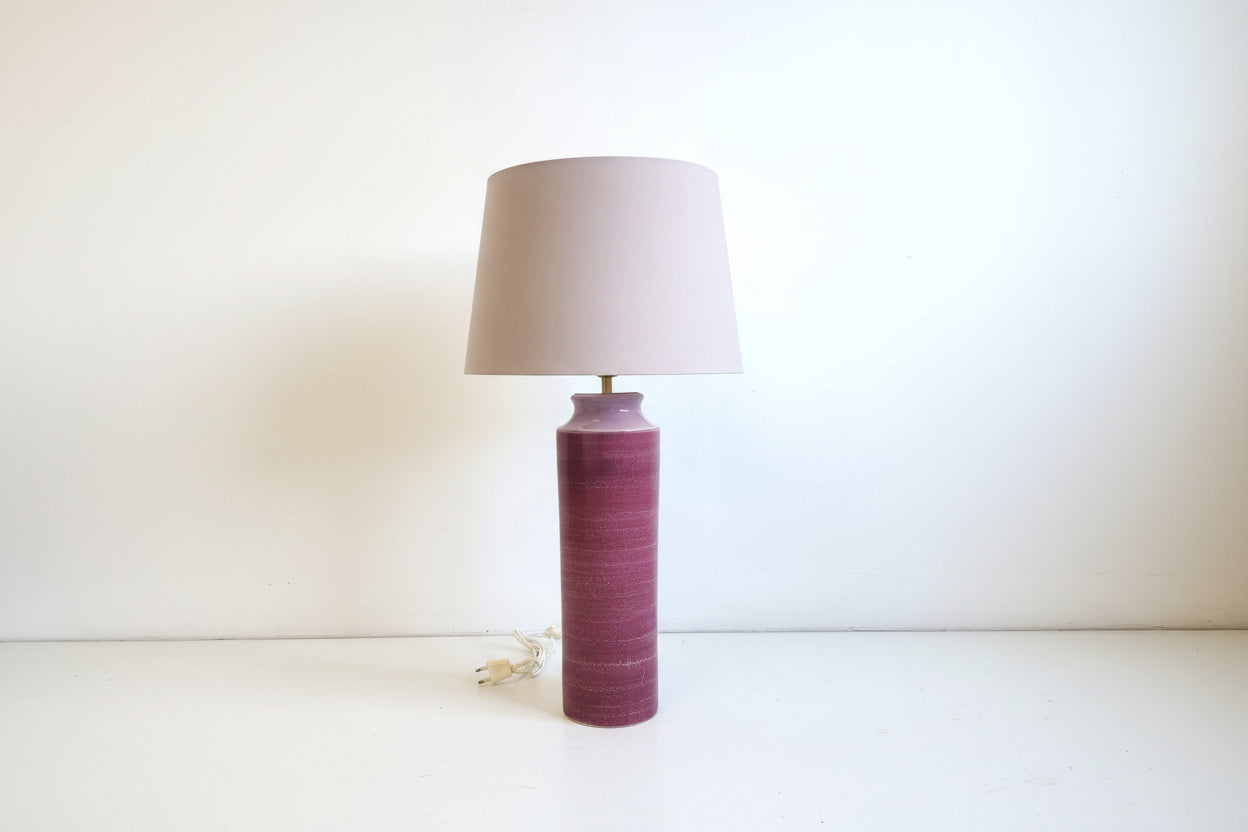 tall ceramic table lamp with pink iron glaze and grey silk shade
