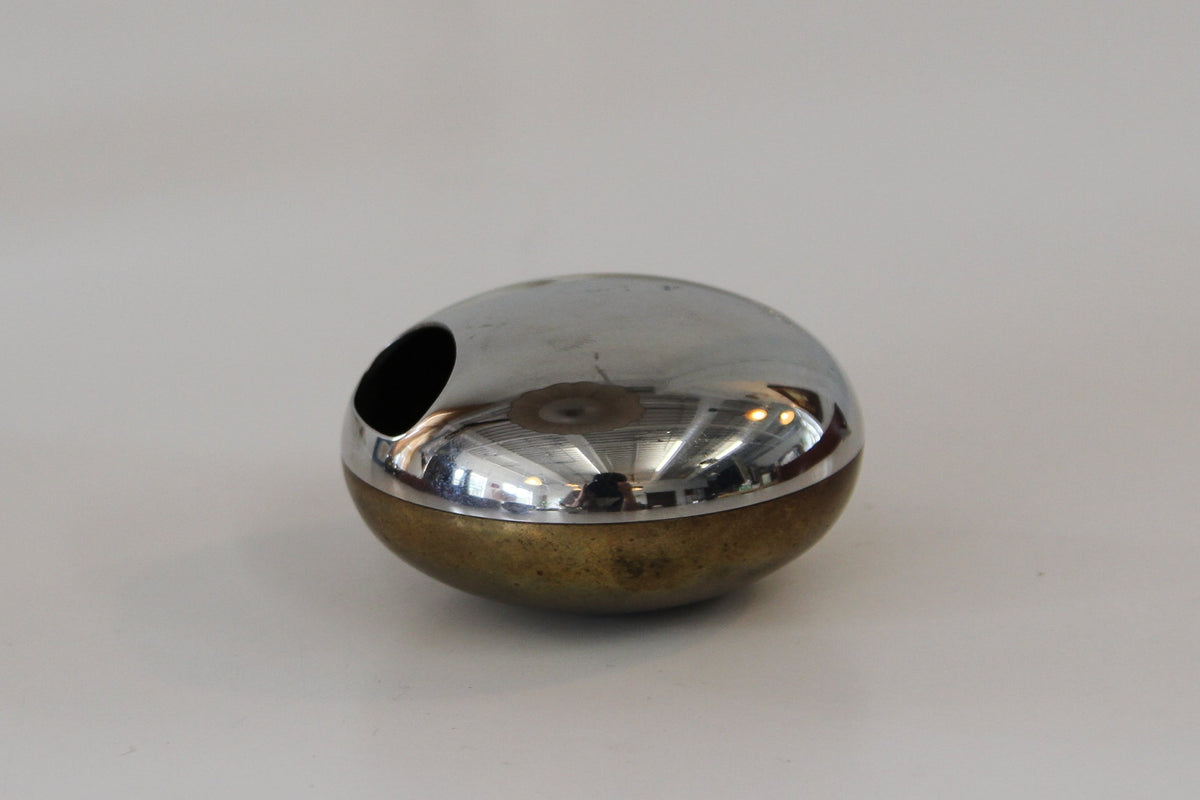 Georg Jensen Orb bottle opener, round with silver top and brass bottom with a hole in one side