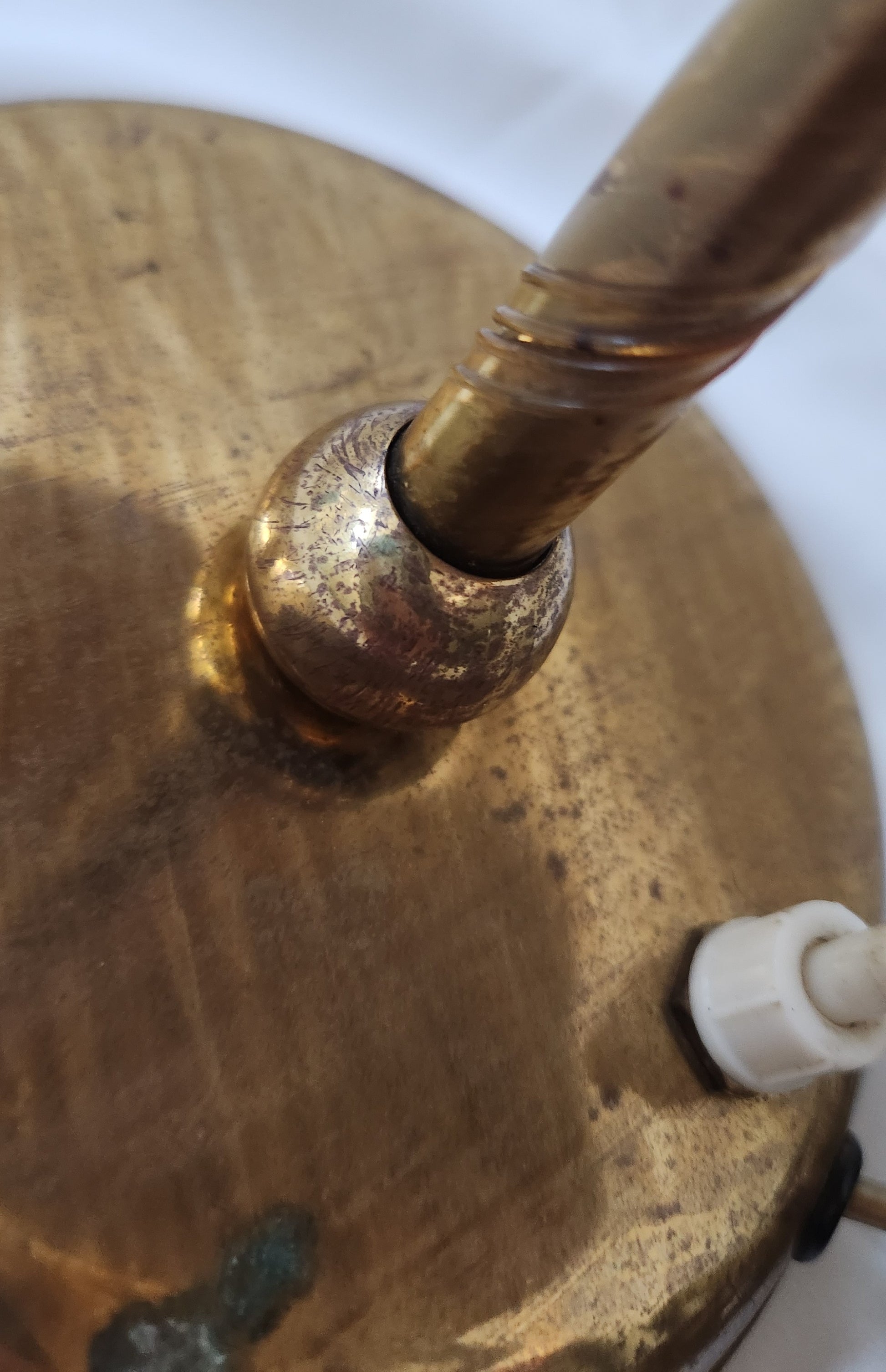 Close-up of a brass fitting with patina