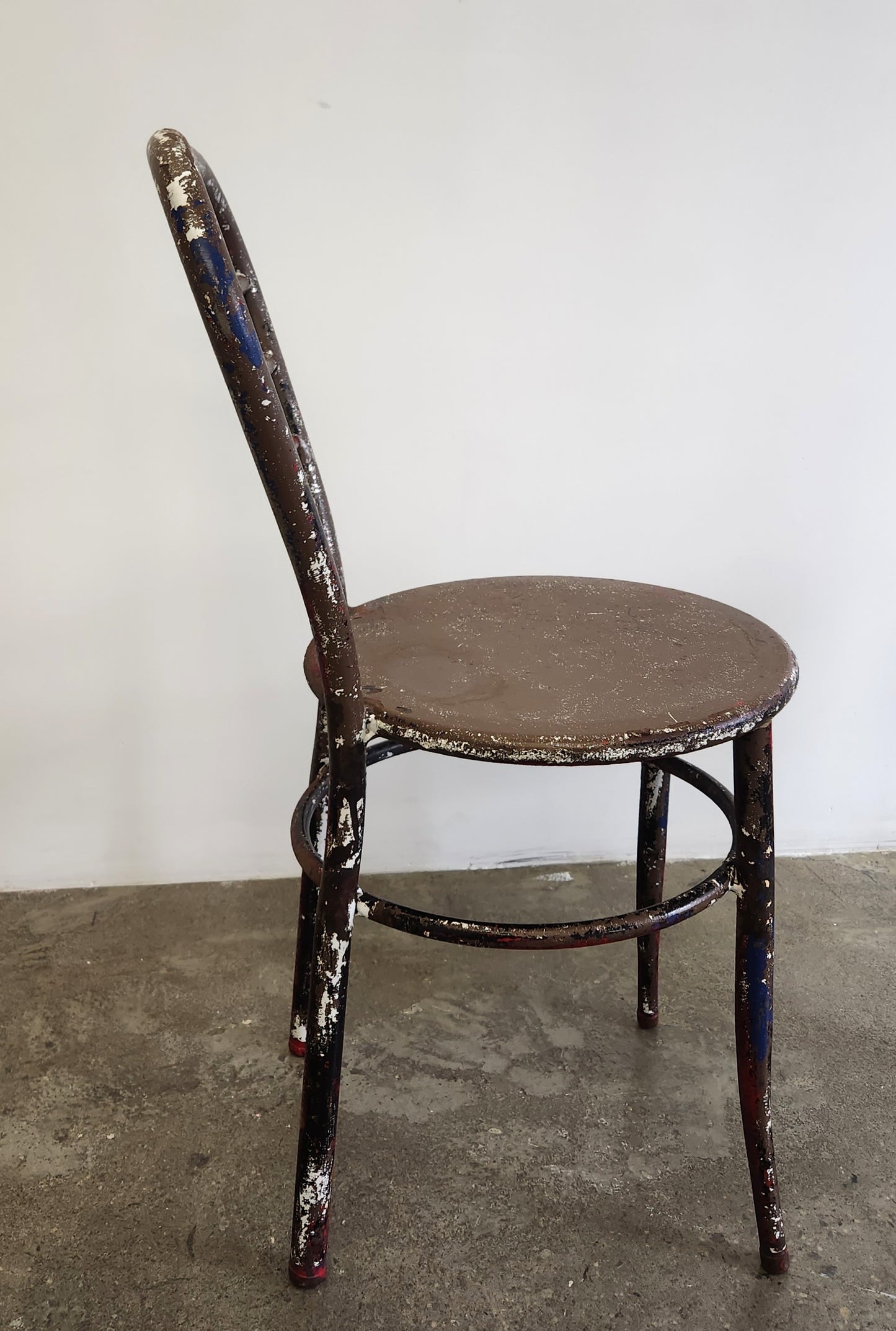 side view of vintage metal ice cream parlour chair